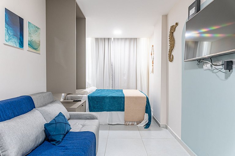 Studio c/ piscina rooftop pertinho da praia - S109